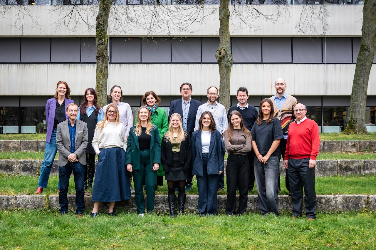 Swyppe team standing in grass